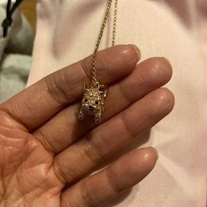 Kate Spade sparkling piggy necklace.